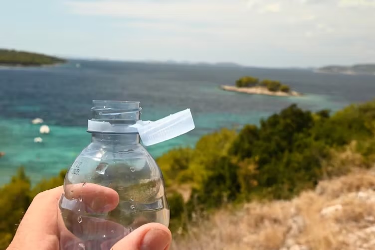 Why plastic bottles now have their caps attached