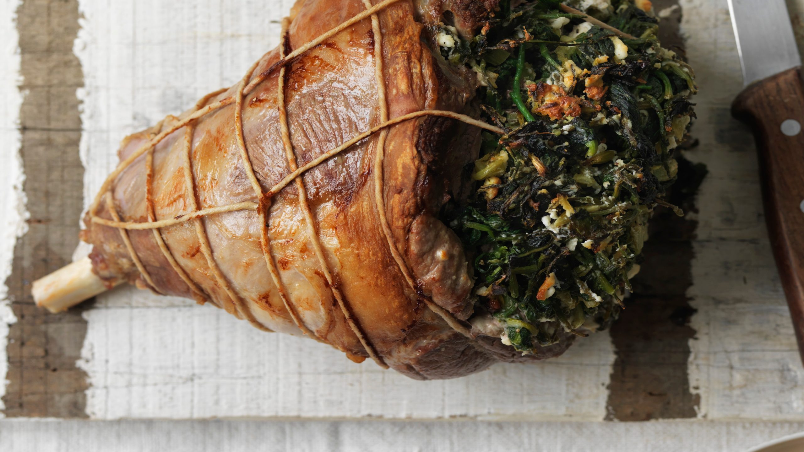 overhead shot of lamb on a chopping board