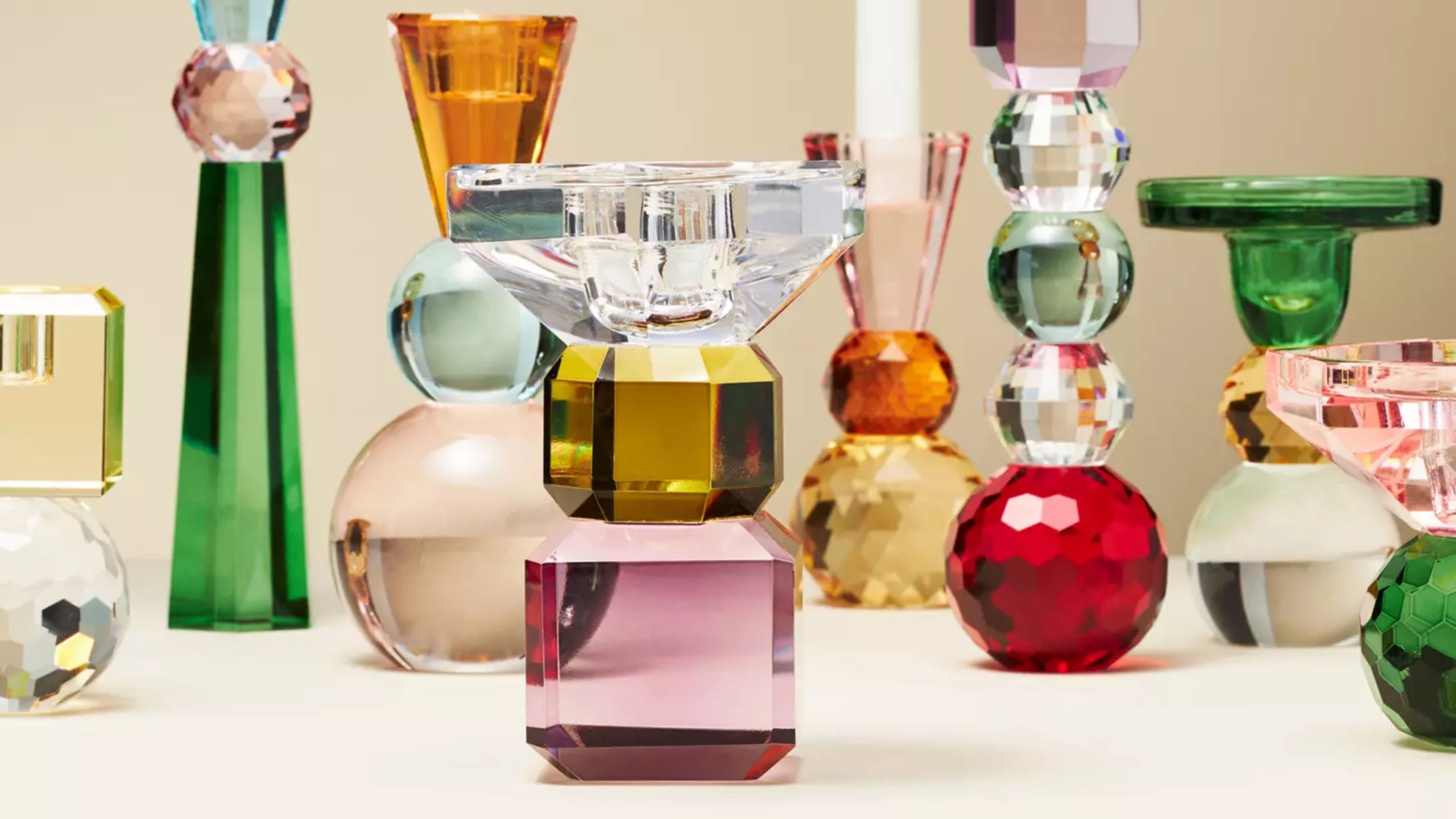 Assorted Anthropologie Cut Glass Candle Holders, which feature stacked geometric shapes