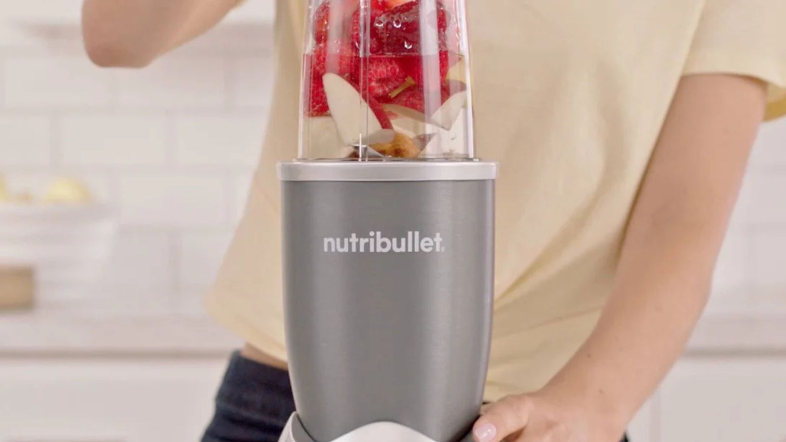 Nutribullet 600 in silver blending a smoothie