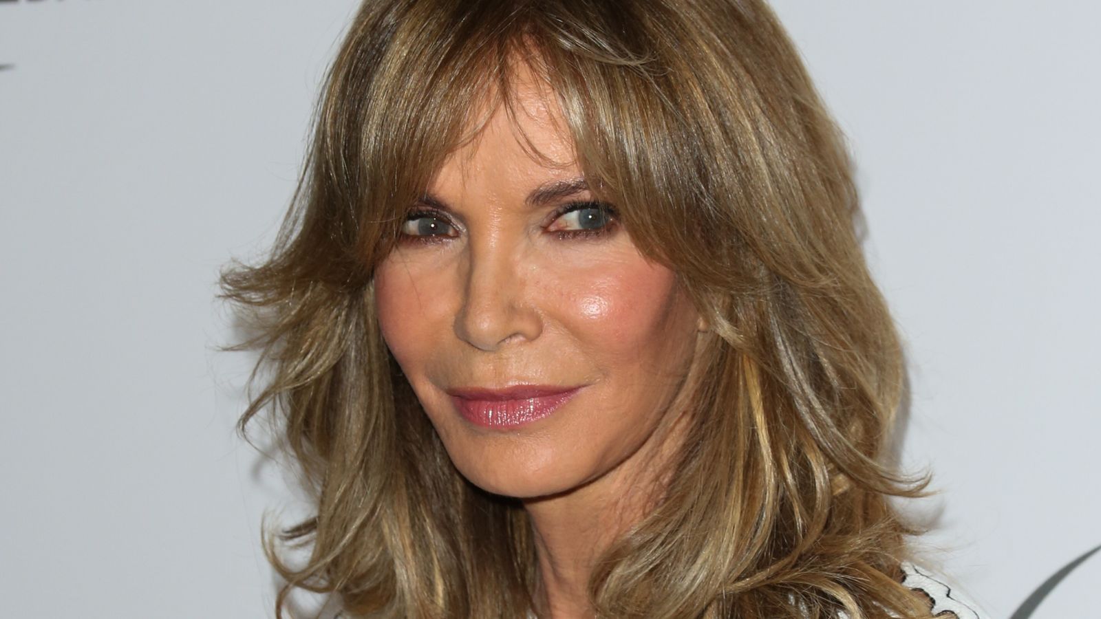 jaclyn smith on a white background