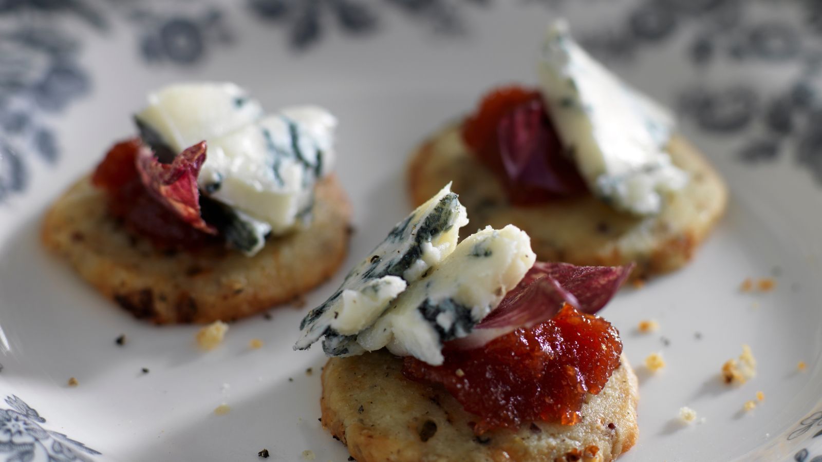 Crackers with cheese and quince jelly