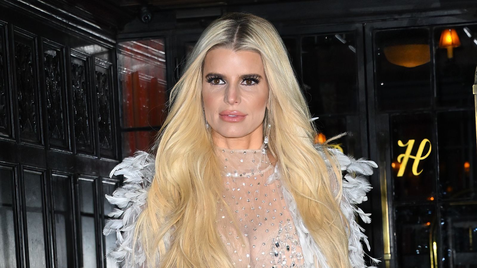 jessica simpson on a black background