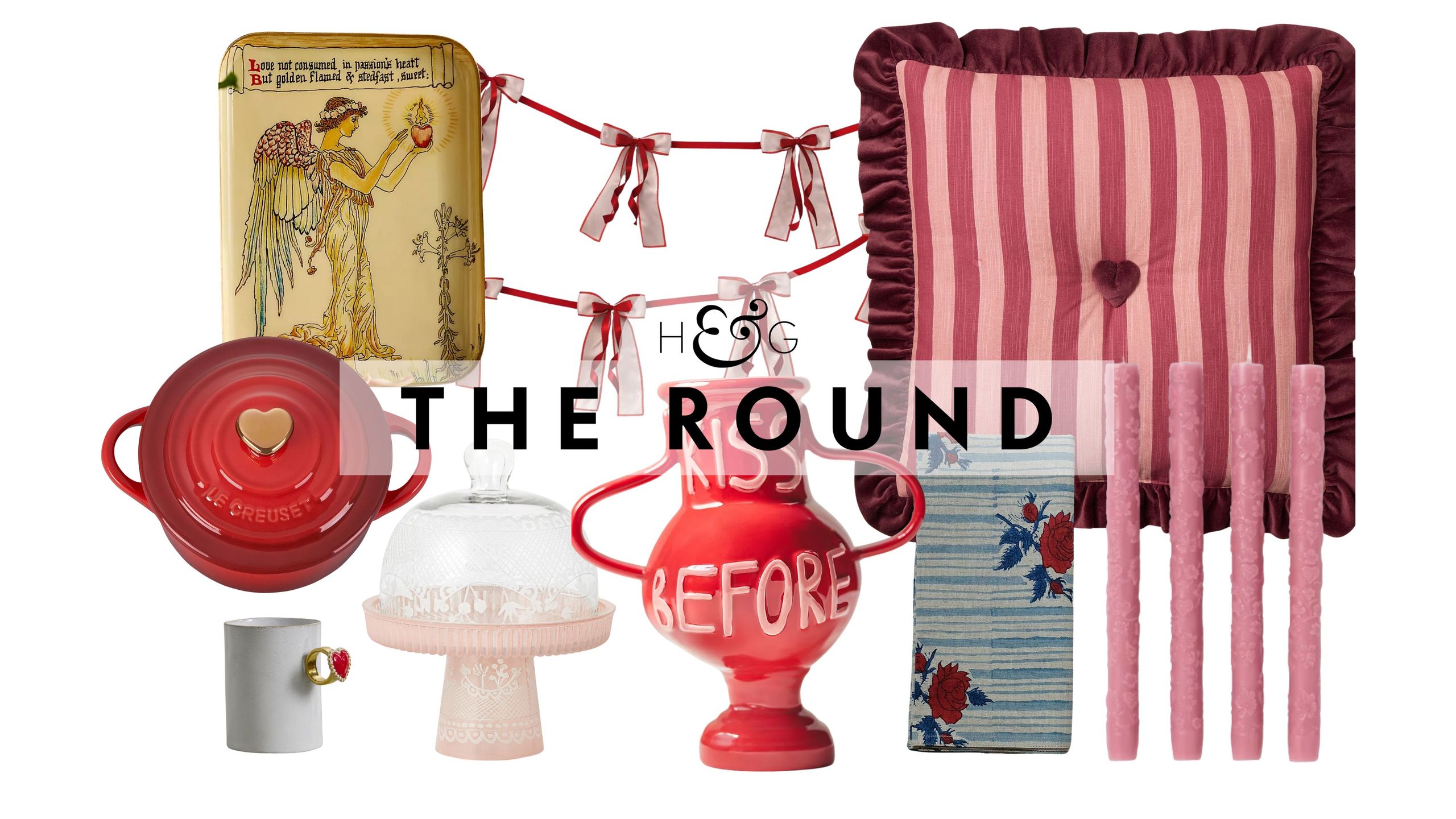 A collage of Valentine's Day Decor, including a heart-shapped Le Creuset, heart-ring mug, archival-style angel tray, cake cloche, red ceramic vase, bow garland, floral napkin, pink taper candles, and a striped throw pillow, pictured against a white background