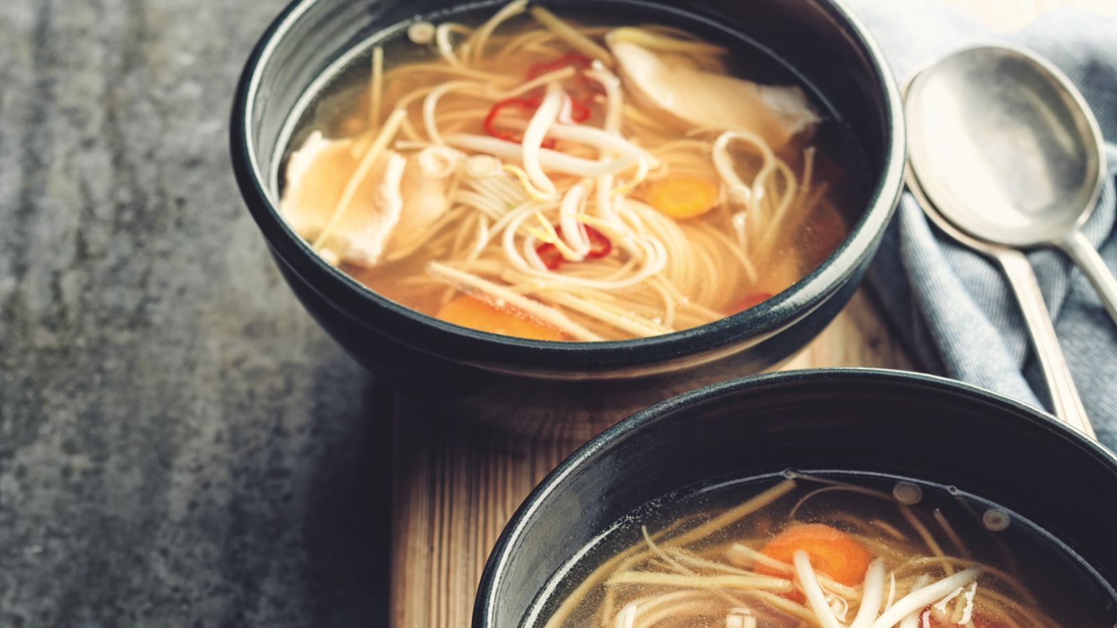 Bowls of chicken noodle soup