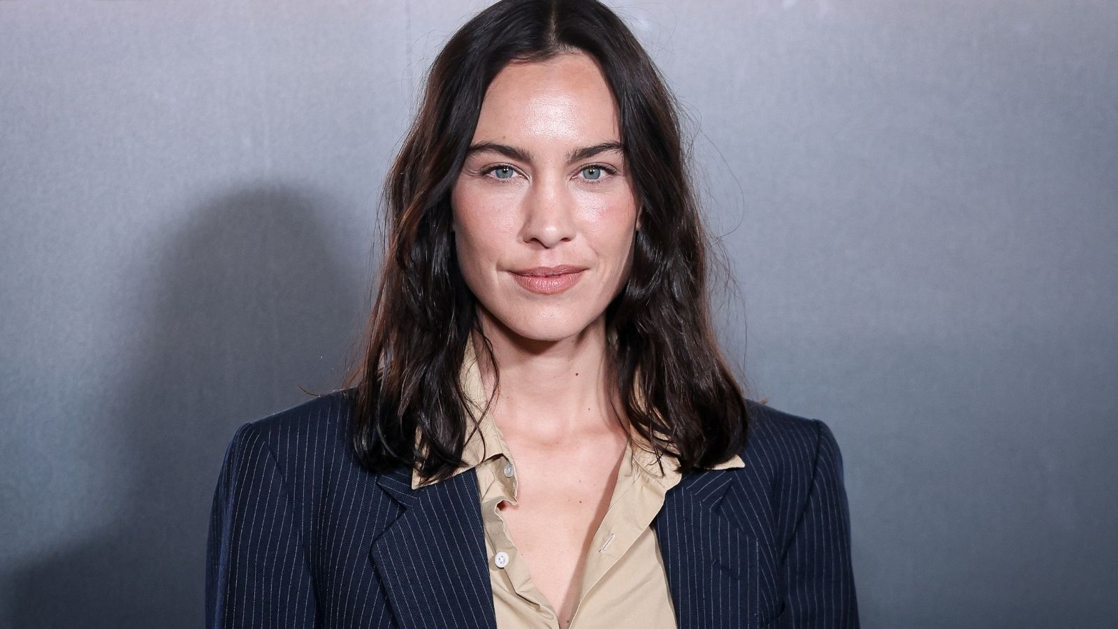 alexa chung on a gray background