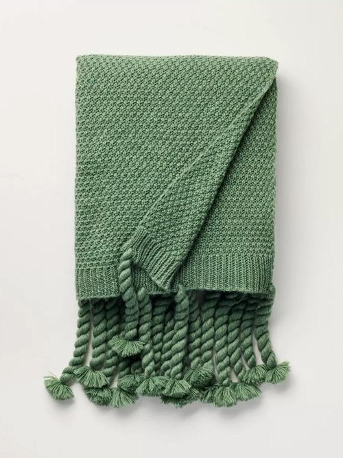 Strickdecke – Herd und Hand mit Magnolie