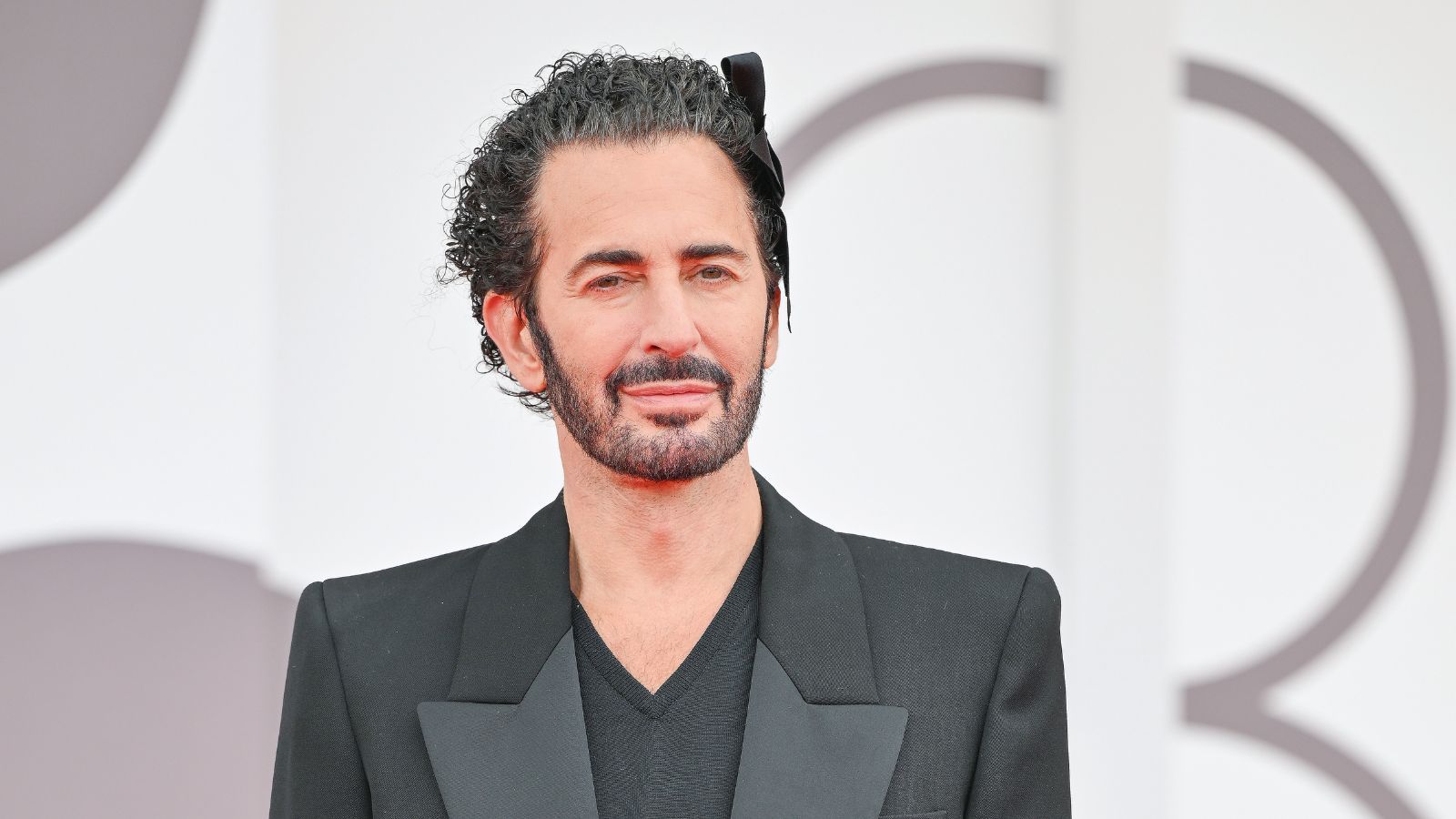 Marc Jacobs wearing a black tuxedo