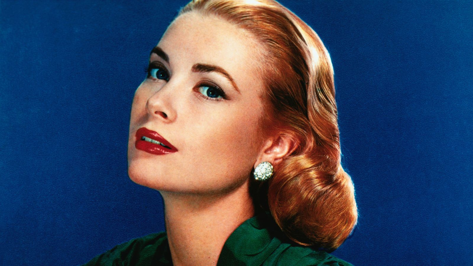 grace kelly on a navy blue background