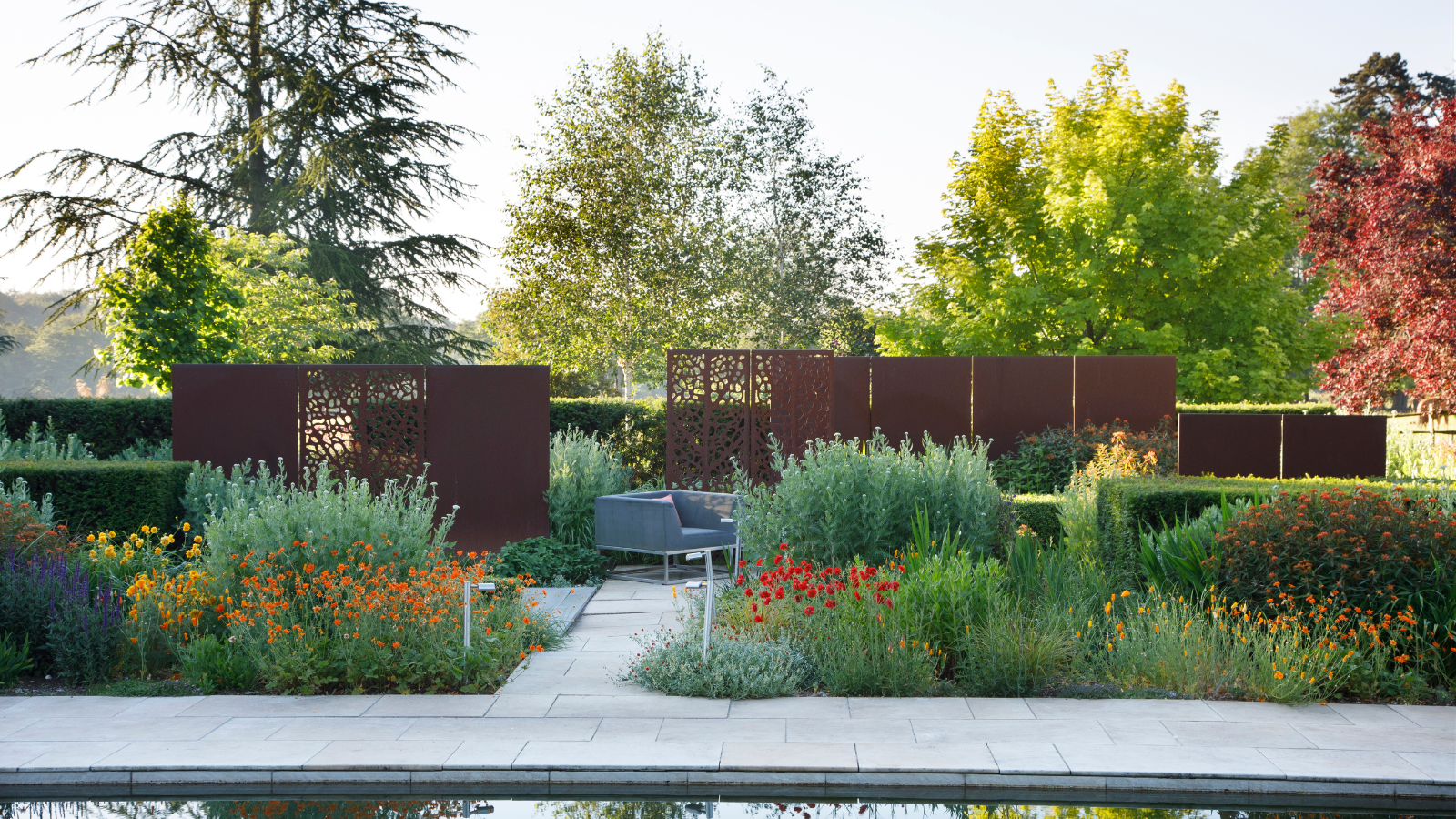 an outdoor space with a privacy screen