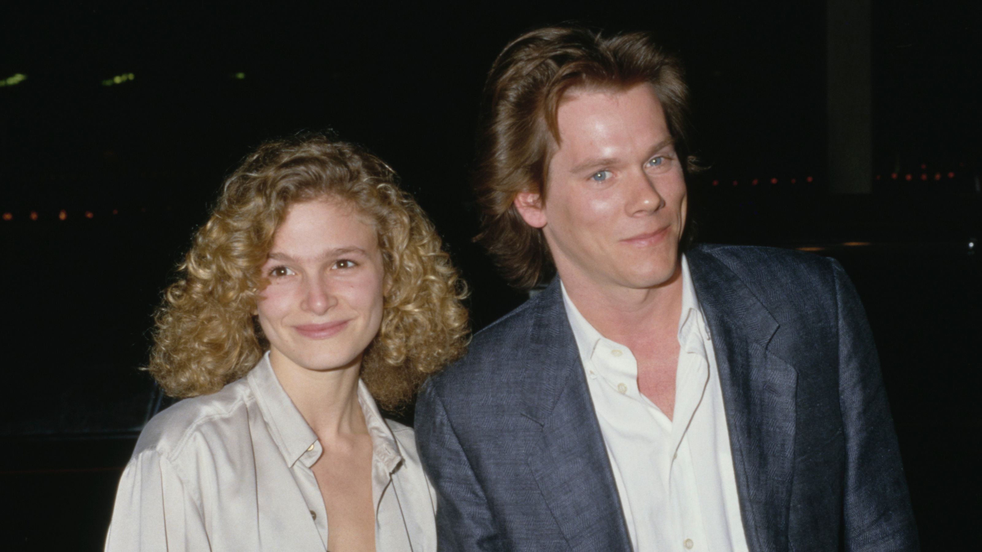 Kevin Bacon und Kyra Sedgwick auf schwarzem Hintergrund