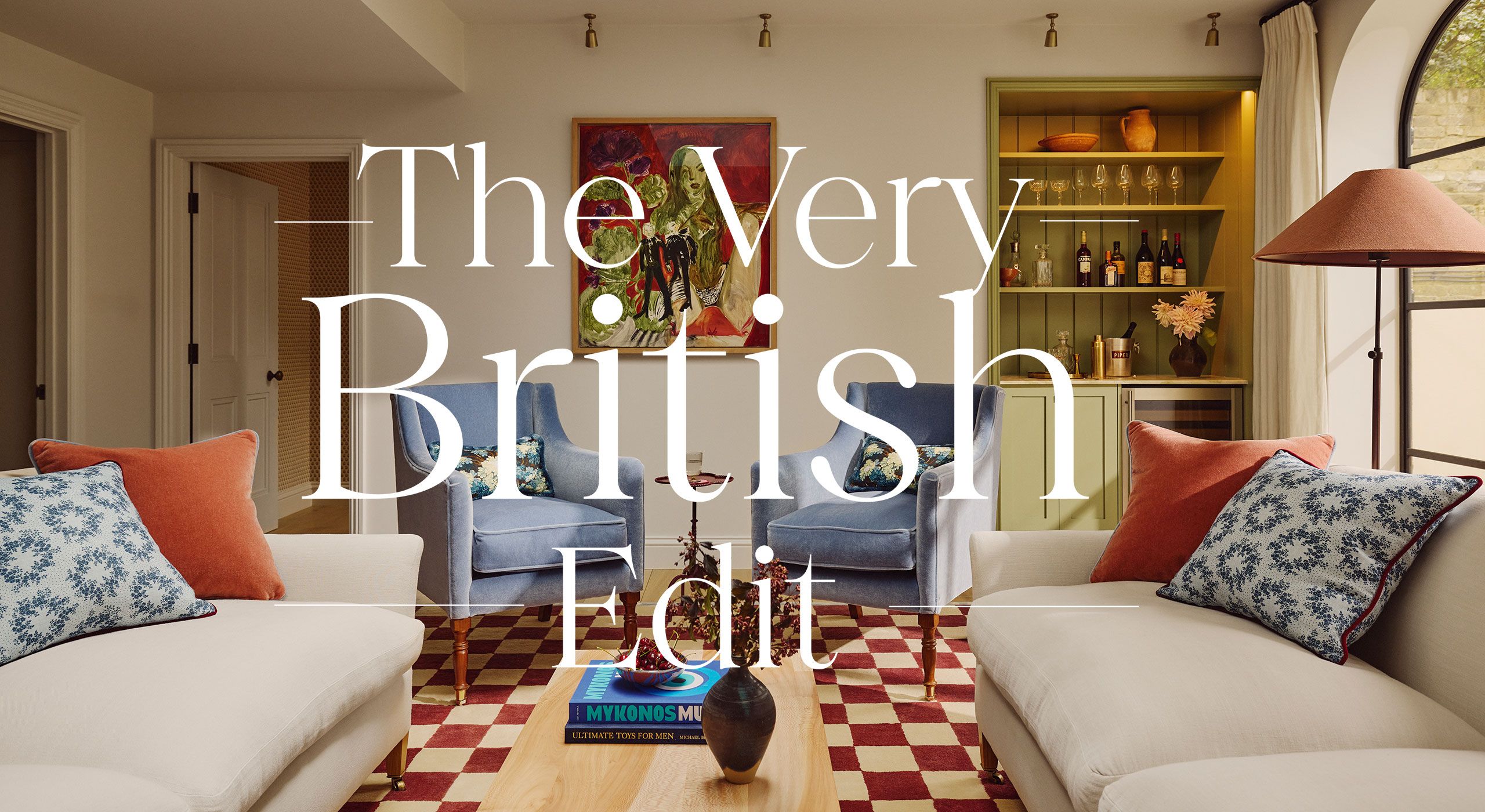 Living room with cream walls and cheque flooring in red and cream with blue armchairs